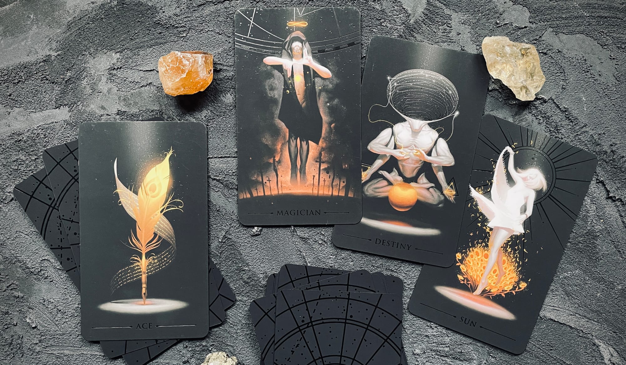 ace of wands, magician, destiny (wheel of fortune) and sun from the true black tarot