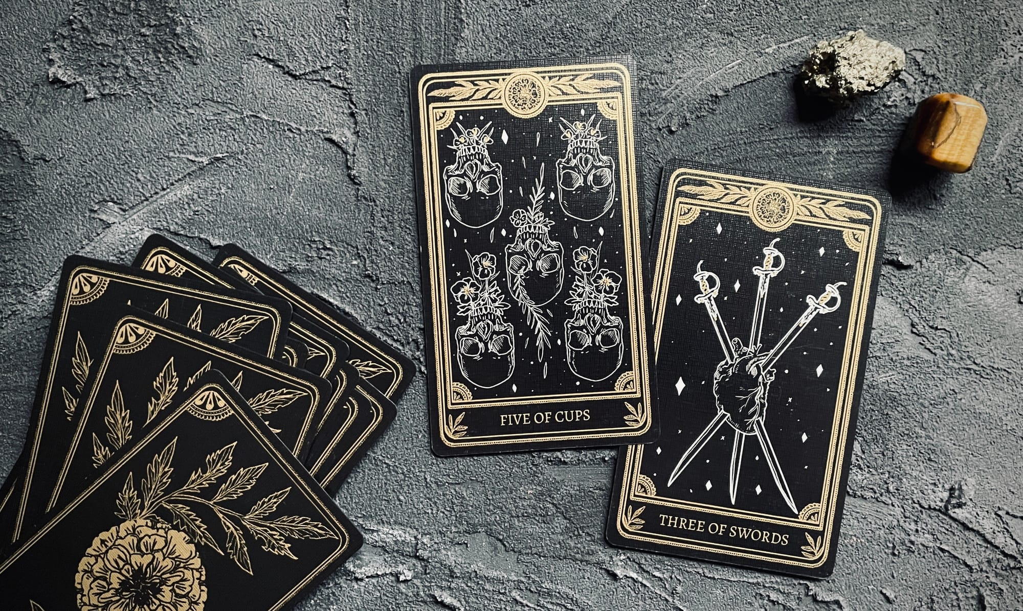 five of cups & three of swords from the marigold tarot
